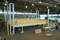 Cargo Vator lift for airplane wing assembly
